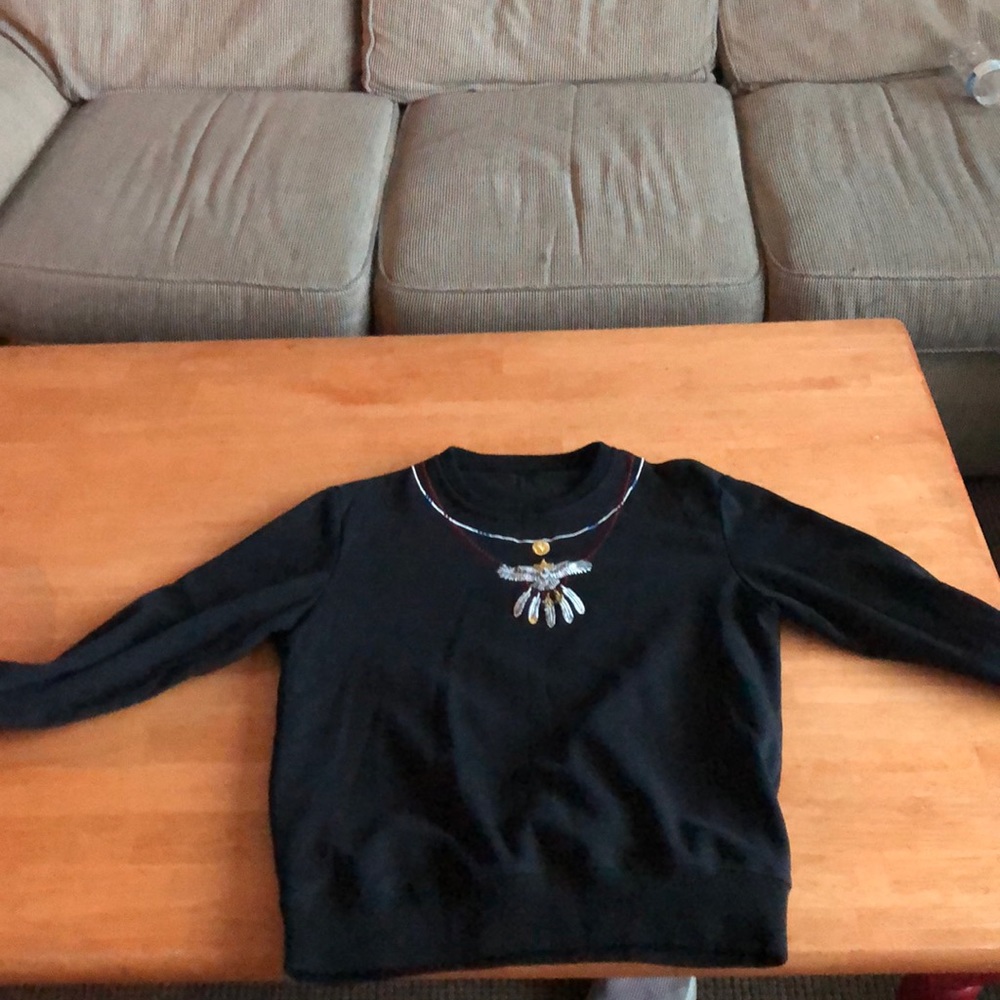 Large sweater with native flower stitching